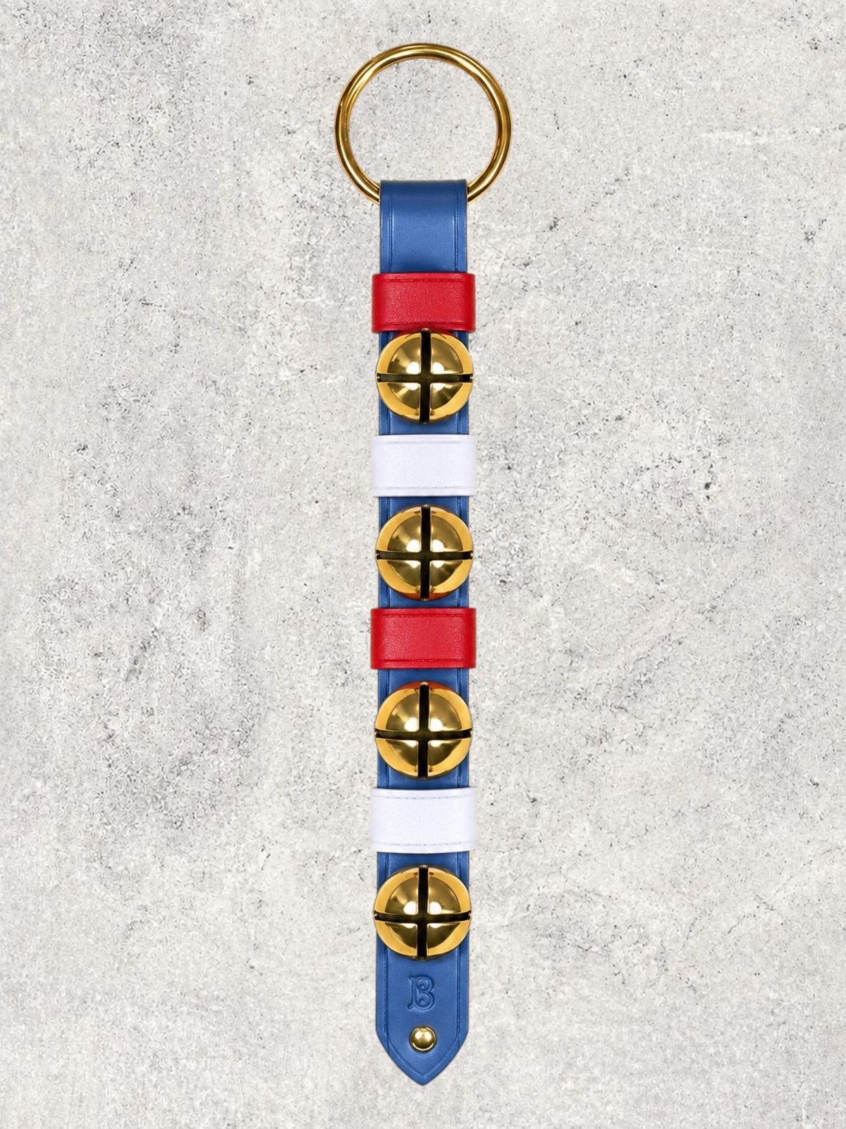 Four solid brass colonial-style bells on a blue leather strap with red & white keepers