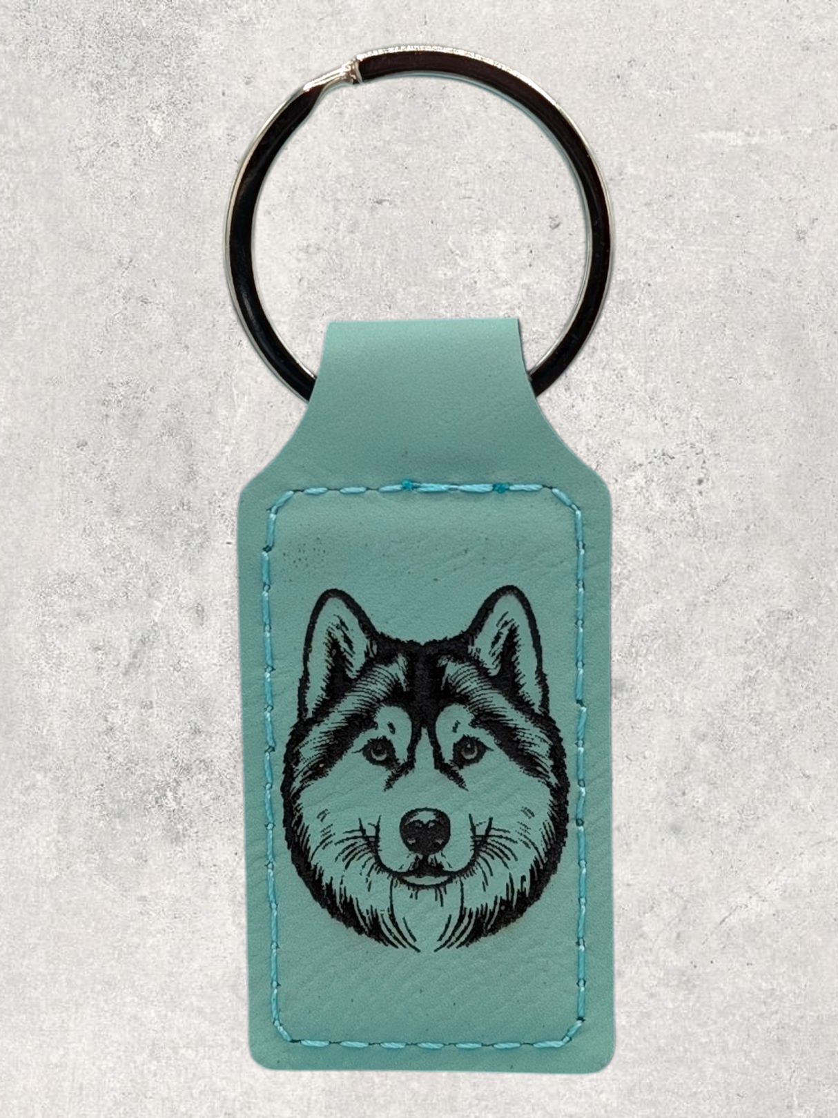 Siberian Husky leatherette keychain in teal rectangular shape