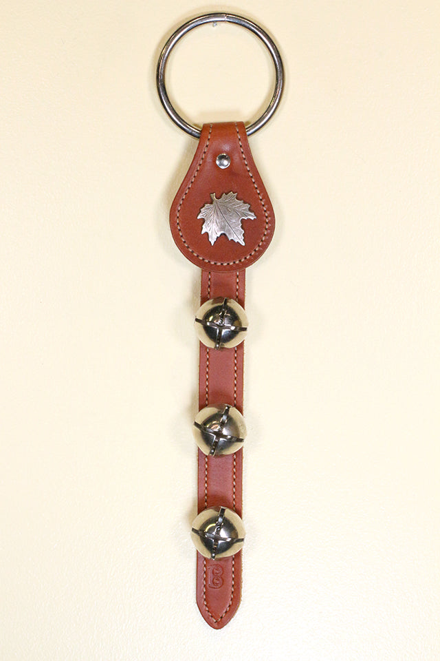 MAPLE LEAF CHARM above 3 Bells on Leather Strap