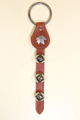 MAPLE LEAF CHARM above 3 Bells on Leather Strap