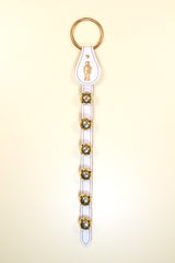 NUTCRACKER CHARM above 6 Bells on Leather Strap