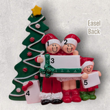 3 PEOPLE on CHRISTMAS MORNING TABLETOP DECORATION