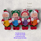 4 PEOPLE with CHRISTMAS LIGHTS TABLETOP DECORATION