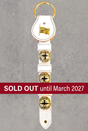Flag Charm bell strap with matching sold-out banner lettering