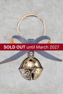 Silver Belsnickel bell doorhanger with blue leather bow and straight dark red SOLD OUT until March 2027 banner